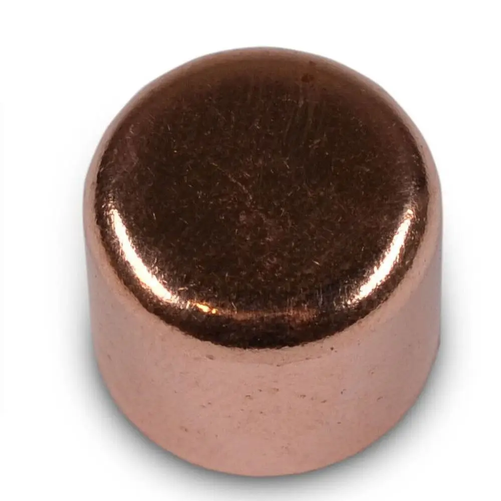 Kupferne Schutzkappe mit flacher Oberseite, hergestellt von Remko. Sie ist zylindrisch und hat eine glatte Oberfläche ohne erkennbare Markierungen oder Maße.