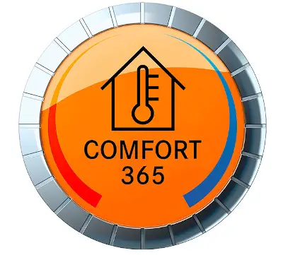 Runder, orangefarbener Temperaturregler mit Symbol für Heizsystem, versehen mit der Aufschrift "COMFORT 365". Geeignet für die Nutzung mit Daikin Heizlösungen.