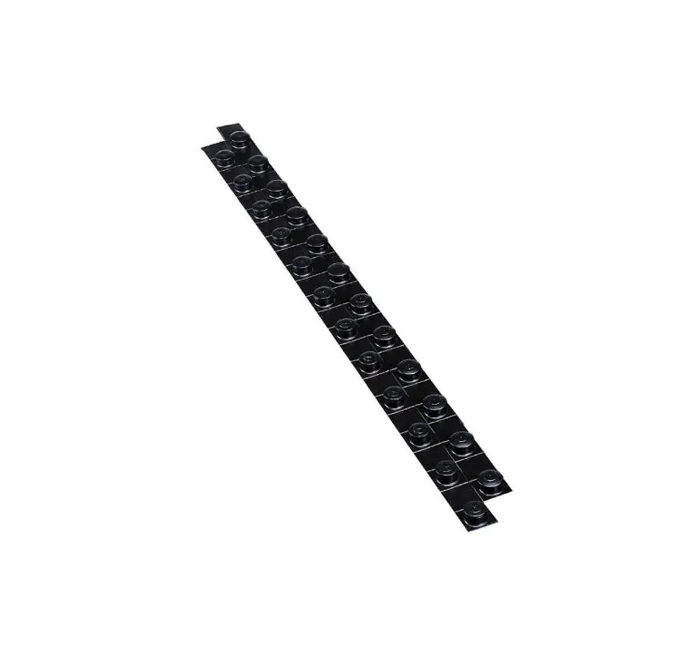 Schwarzes Noppenverbinder-Element von Purmo, bestehend aus mehreren aneinandergereihten Noppen, geeignet zum Verbinden von Bauteilen.