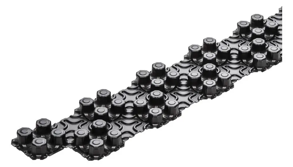 Verknüpfungsstreifen in Schwarz, aus mehreren Elementen zusammengesetzt, mit hohen, runden Kappen. Produkt von Kermi. Ideal für flexible Verbindungen in verschiedenen Anwendungen.