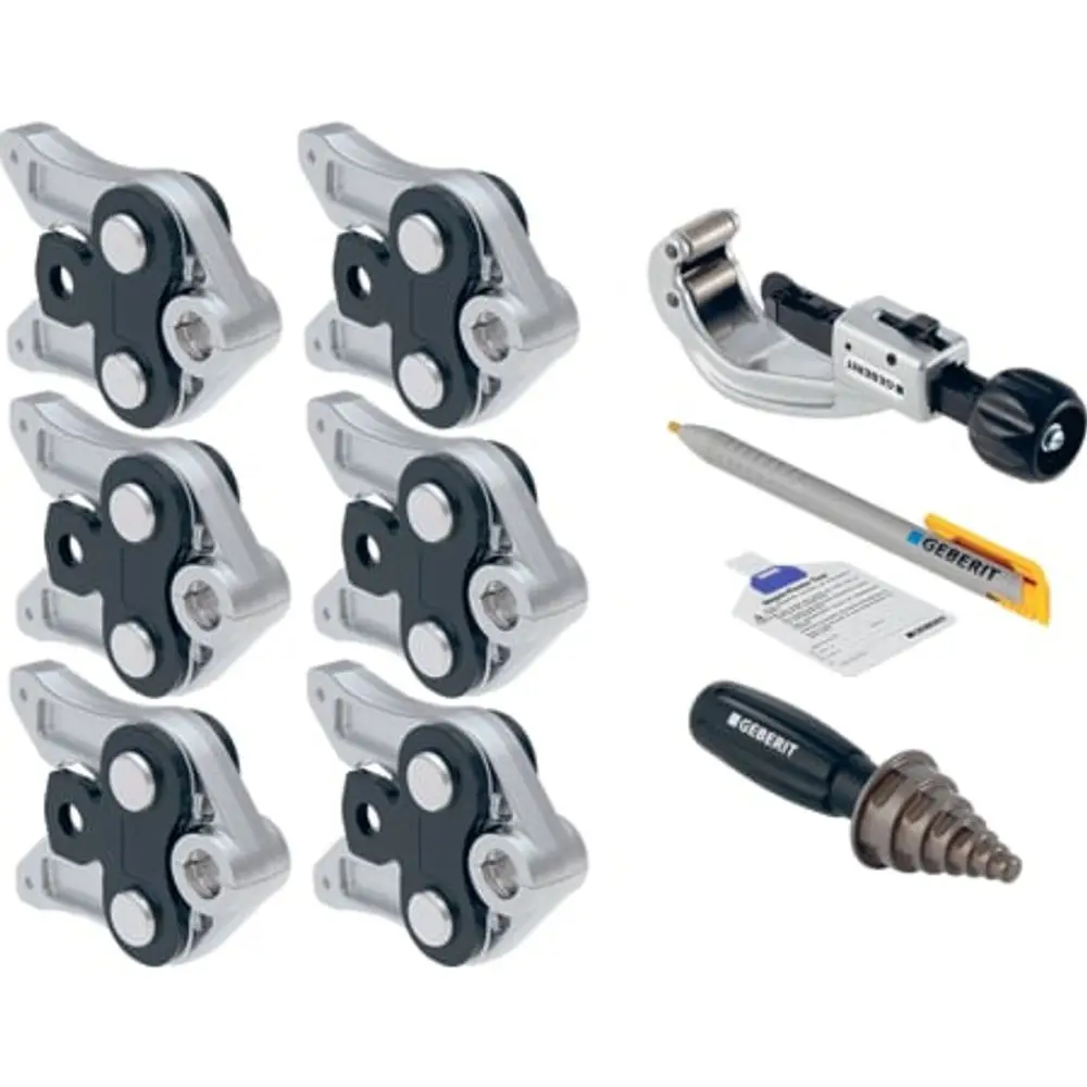 Mepla Set mit mehreren Pressbacken und Geberit Werkzeugen, darunter ein Rohrschneider und Markierstift, zur Verwendung in der Rohrinstallation.