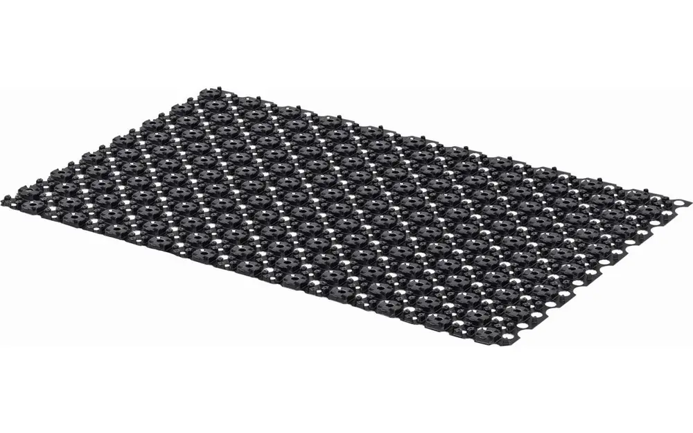 Schwarzes Folienelement mit einer strukturierten Oberfläche, das von Uponor produziert wird. Es zeigt eine Vielzahl von geometrischen Mustern.