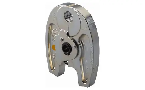 Pressbacken von Uponor, metallisch, mit zwei Öffnungen und einem Mechanismus zur Verriegelung. Eignet sich vermutlich für Anwendungen in der Rohrverbindungstechnik.