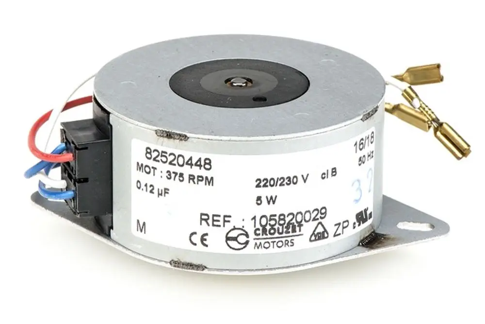 Synchronmotor mit Anschlussklemmen und zwei Leitungen, geeignet für Antriebe. Auf dem Gehäuse sind technische Details und die Marke Resideo sichtbar.