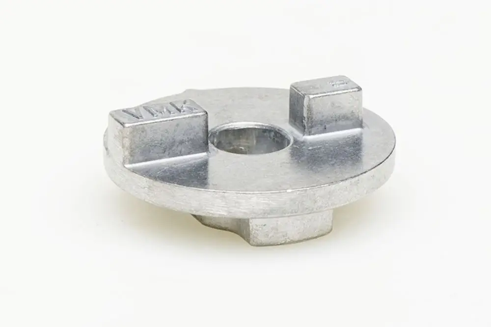 Metallene Kupplung mit zwei seitlichen Erhöhungen. Das Produkt stammt von der Marke Resideo und ist für einen Stellantrieb konzipiert.