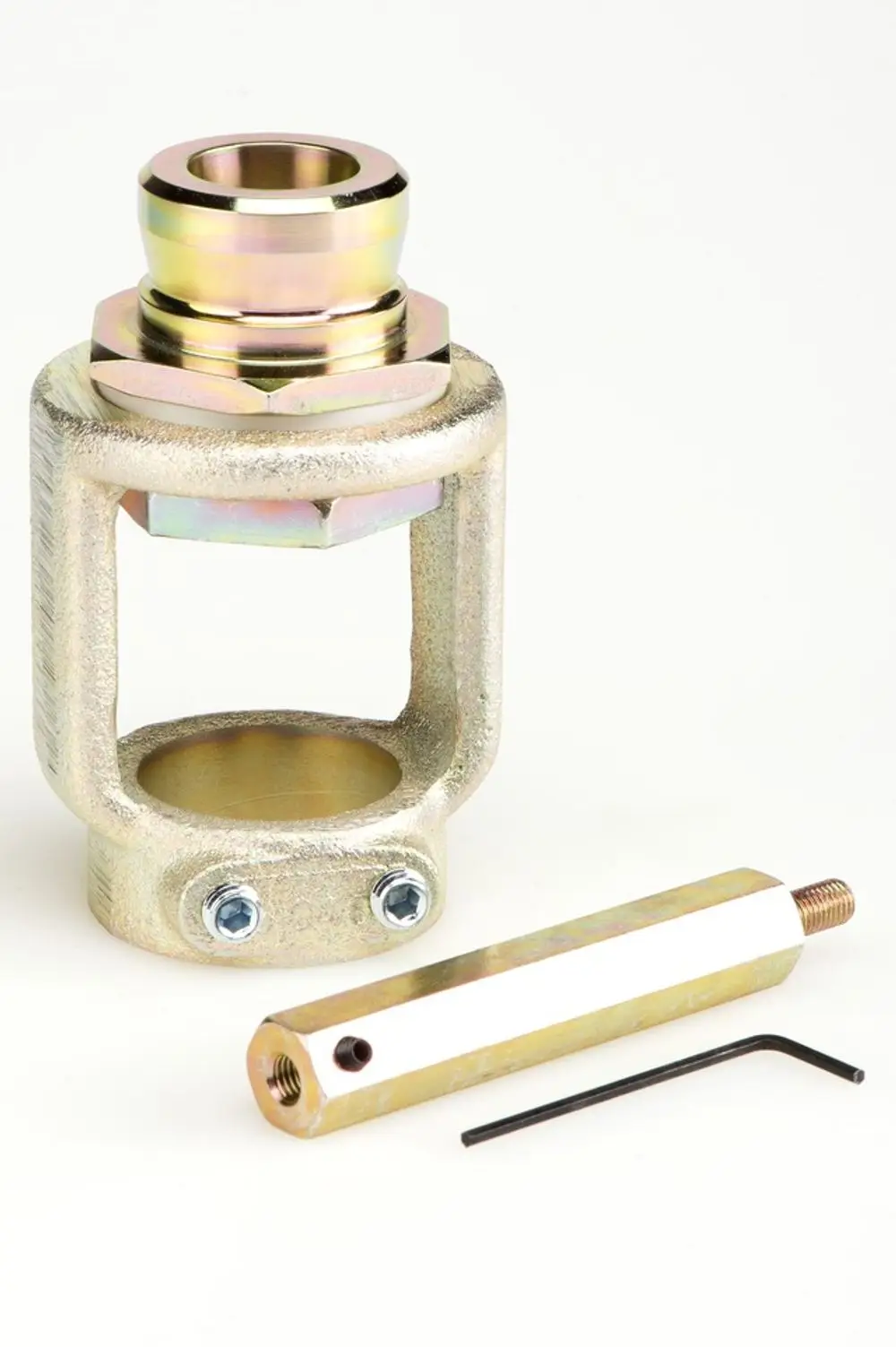 Hochtemperatur-Set von Resideo mit einer Metallstruktur, einer zylindrischen Einheit und einem kleinen Werkzeug, das zur Montage verwendet wird.