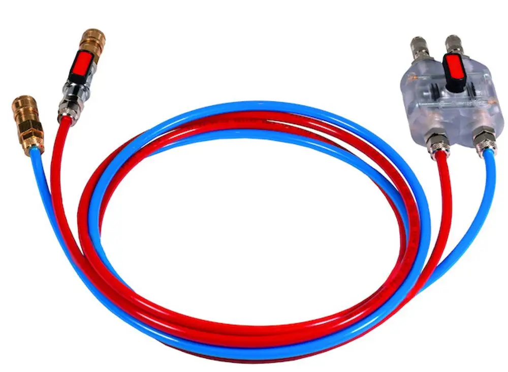 Rotes und blaues Druckschlauchset mit Anschlüssen, geeignet für Messcomputer. Hergestellt von Resideo. Sichtbare Steuerelemente zur Druckregulierung.