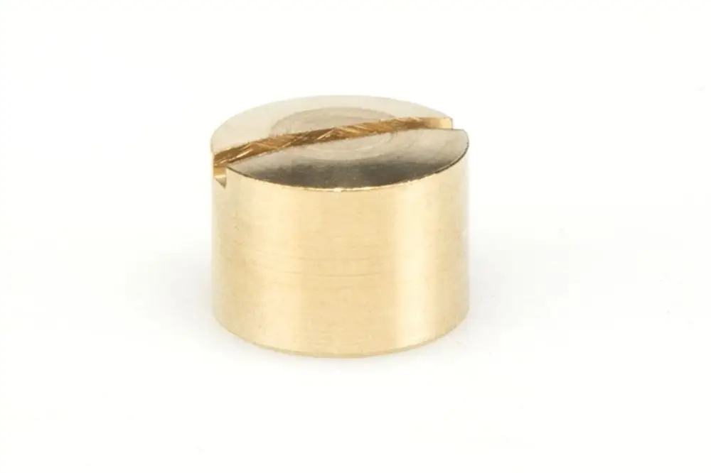 Kreisförmiges Metallteil in Goldfarbe mit einer durchgehenden Nut auf der Oberfläche, möglicherweise für einen Mechanismus von Resideo-Produkten.