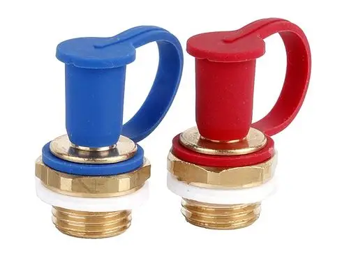 Druckprüfanschlüsse in Rot und Blau für Kombi-QM und Kombi-VX, produziert von Resideo, bestehen aus Metall mit verschließbaren Kappen für die Druckprüfung.