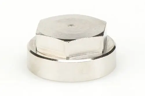 Machined metal cap with a hexagonal shape, likely for sealing purposes. This product is connected to Resideo.