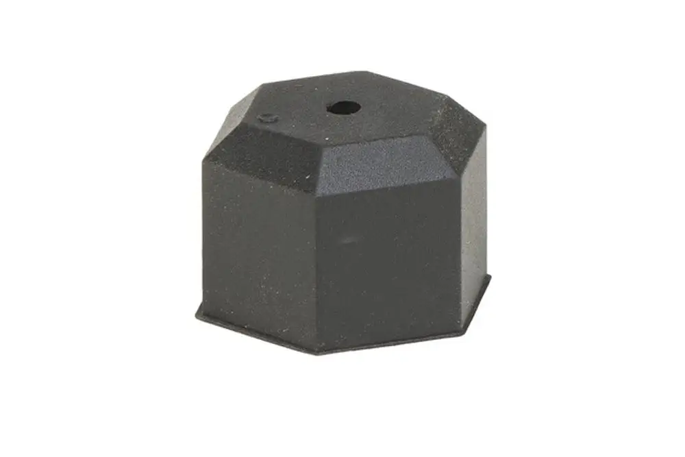 Schwarzer Gummieinsatz mit hexagonalem Design und einem Loch in der Mitte, verwendet in Montagegeräten von Resideo für Thermostatventile.