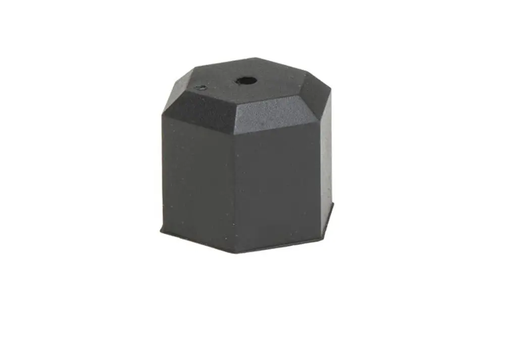Gummieinsatz in Form eines sechseckigen Blocks, verwendet in Verbindung mit einem Montagegerät von Resideo für Thermostatventile.