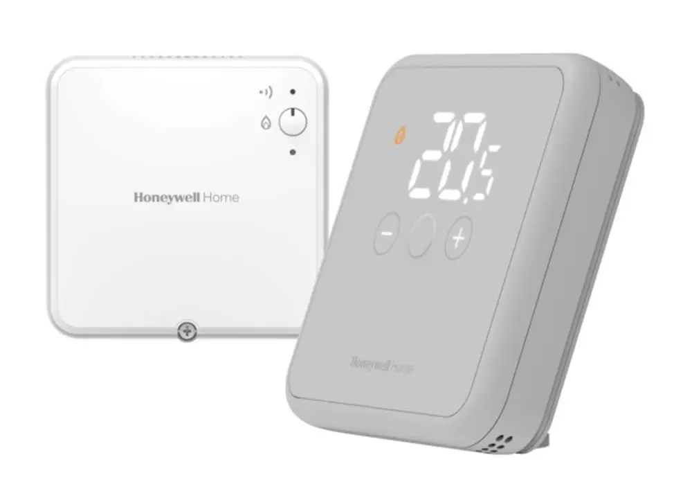 Raumthermostat in grauer Farbe von Resideo mit digitaler Anzeige und +/- Tasten für die Temperaturregelung, sowie einem externen Modul.