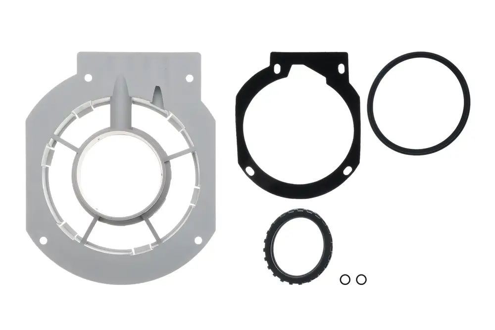 Brötje Abgasadapter mit mehreren Dichtungen und einer Halterung. Teile in verschiedenen Formen und Größen, die zur Abgasanlage gehören.