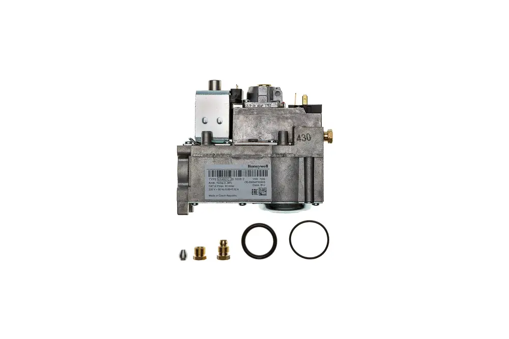 Gasarmatur von Brötje mit mehreren Anschlussmöglichkeiten und Zubehörteilen wie Dichtungen und Reduzierstücken. Metallische Oberfläche, geeignet für Gasinstallationen.