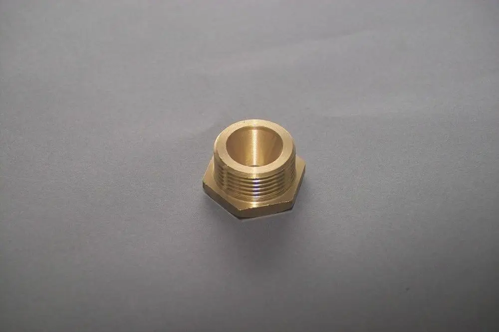 Brass fitting with external threads and a hexagonal base, typically used in gas applications, possibly part of a Brötje heating system.