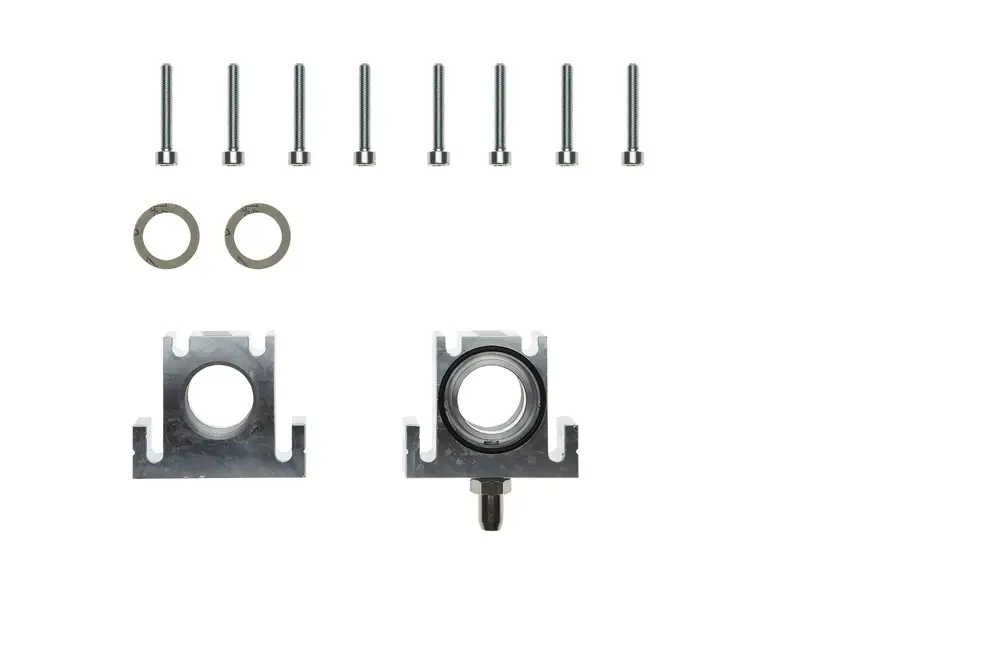 Flansch für Gasventil, bestehend aus zwei Metallteilen mit kreisförmigen Öffnungen, Schrauben und Unterlegscheiben; Produkte von Brötje.