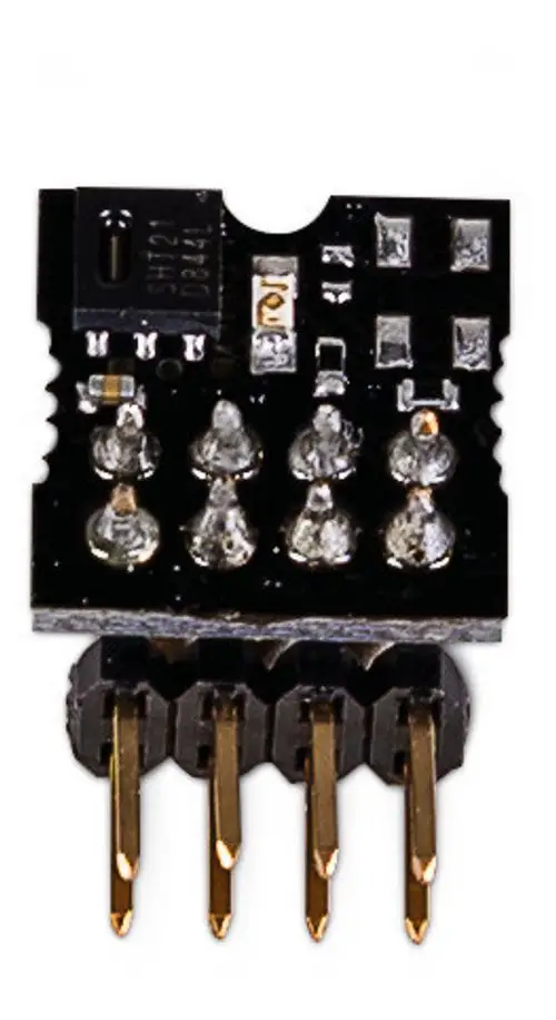 Sensor-Modul mit goldenen Pins, zur Messung von Feuchtigkeit und Temperatur, von der Marke Pluggit, mit mehreren Lichtdioden auf einer schwarzen Leiterplatte.