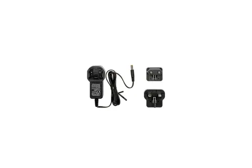 Netzteil mit wechselbarem Stecker für Brötje Produkte. Elektrisches Kabel mit Anschlussbuchse. Adapter für verschiedene Steckdosenformate abgebildet.