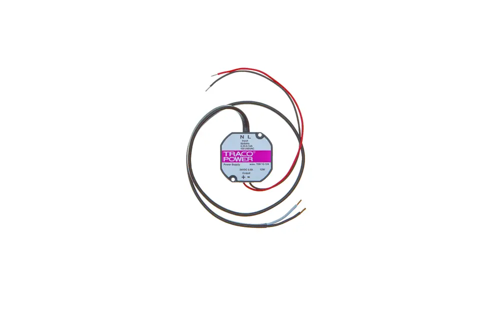 Brötje Schaltnetzteil mit vier abgehenden Kabeln. Kompakte Bauform mit Anschlussklemmen für die elektrische Verbindung. Gezeigt auf einem neutralen Hintergrund.