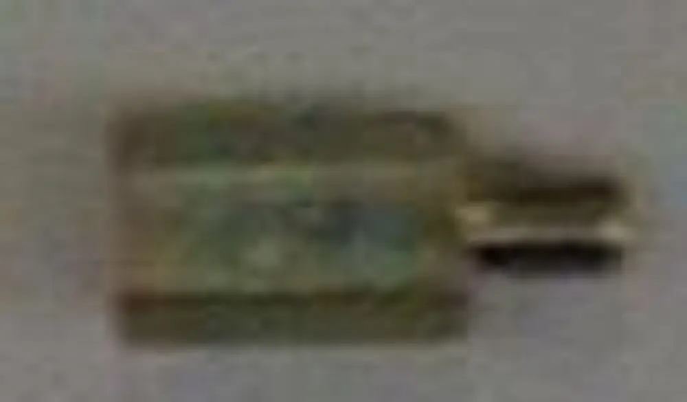 Brötje Distanzstück in hellem Farbton, rechteckige Form mit seitlichem Anschluss. Das Bild zeigt das Produkt vor neutralem Hintergrund.