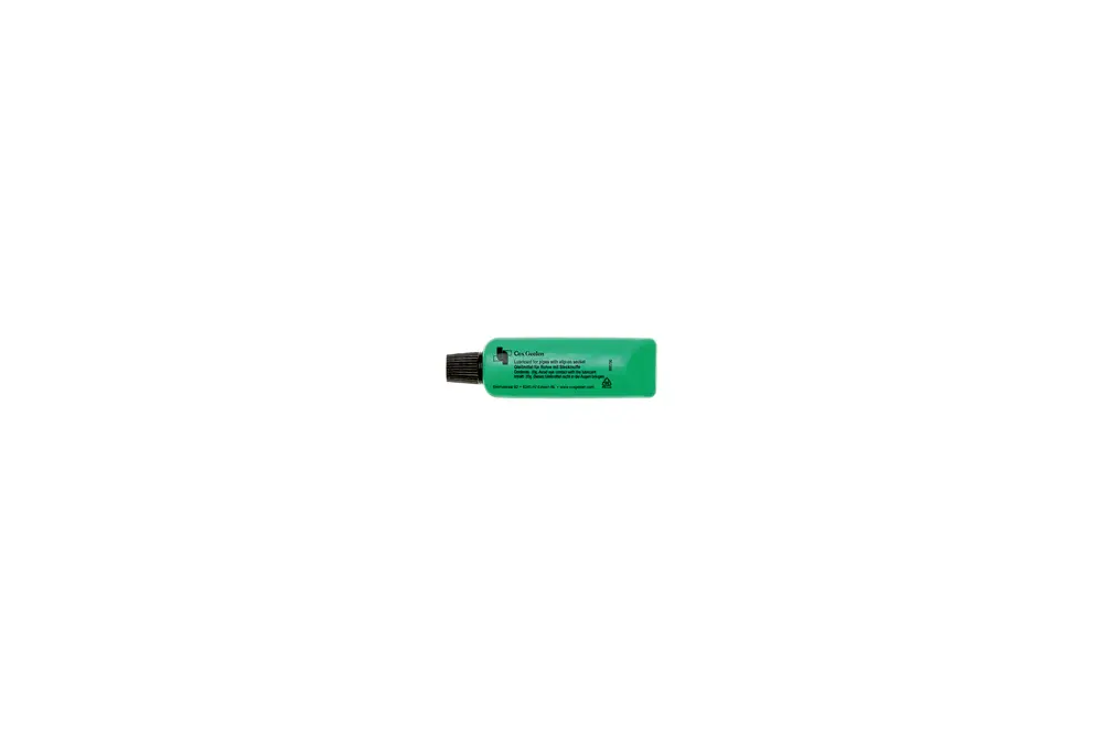 Grüne Tube mit schwarzem Verschluss, beschriftet mit Anwendungsinformationen. Produkt gehört zur Marke Brötje.