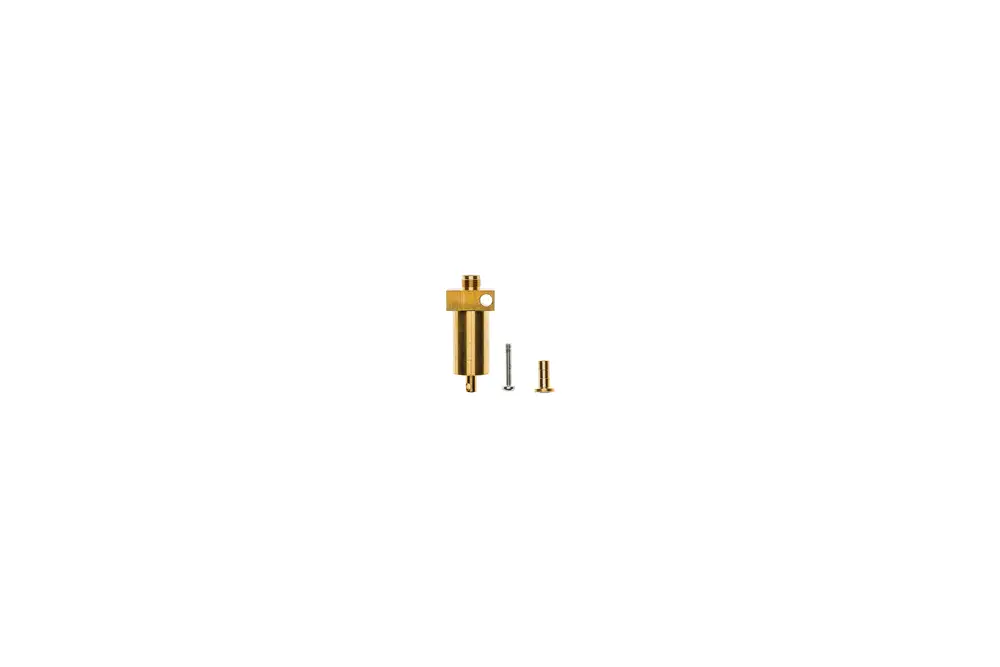 Brass component set by Brötje, consisting of a cylindrical part with a hexagonal head and a hole, accompanied by two smaller metal fittings.