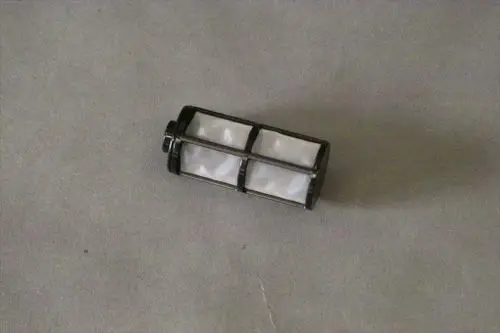 Brötje Filtereinsatz für eine Dosierpumpe, mit transparenten Filtern in einem stabilen Gehäuse. Das Produkt zeigt eine zylindrische Form.
