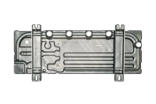 Metallisches Bauteil mit strukturiertem Design und mehreren Öffnungen, möglicherweise Teil eines Heizsystems der Marke Brötje.