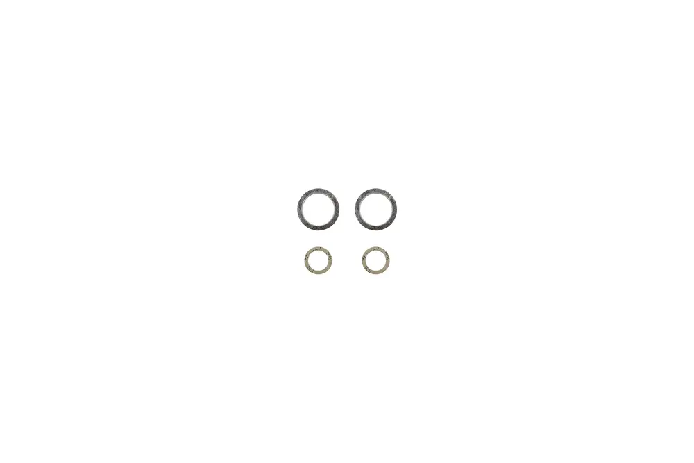 Brötje Dichtungen, zwei große und zwei kleine Ringe, in verschiedenen Materialien und Größen, auf weißem Hintergrund angeordnet.