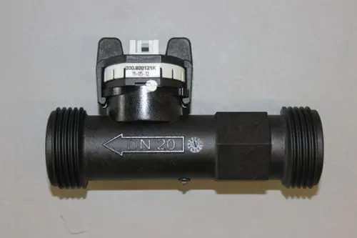 Brötje Sensor mit einem geraden Rohrstück und gefrästem Gewinde. Oben befindet sich ein elektrisches Modul mit Anschlussklemmen und Beschriftung.