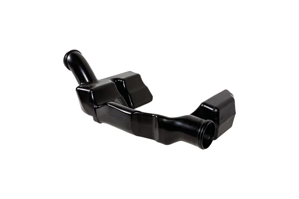 Schwarzer Schalldämpfer von Brötje mit gebogenen Rohren und zwei Anschlüssen. Das Produkt ist aus robustem Material gefertigt und hat eine spezielle Form für die Geräuschdämpfung.