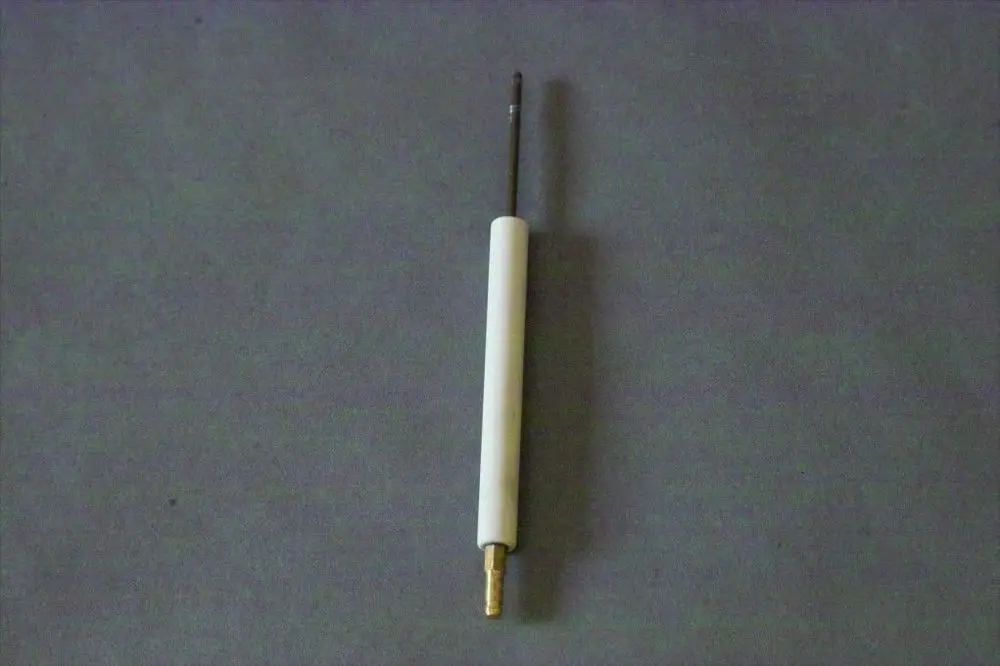 Brötje Stauscheibe in zylinderförmiger Form mit einem weißen Kunststoffgriff und einem metallischen Stift für technische Anwendungen.