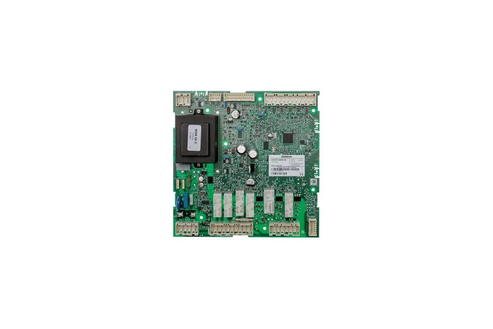 Grüne Steuerplatine von Brötje mit mehreren Anschlussklemmen und einem großen schwarzen Bauteil in der Mitte. Elektronische Komponenten sind sichtbar.