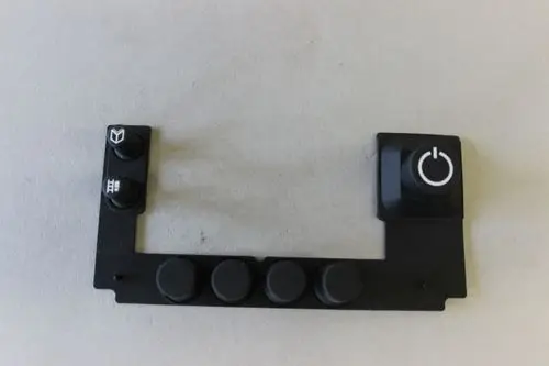 Brötje Elastomer-Tastatur mit mehreren Tasten, darunter Funktionen wie M und eine Powertaste, in schwarzer Ausführung auf grauem Hintergrund.