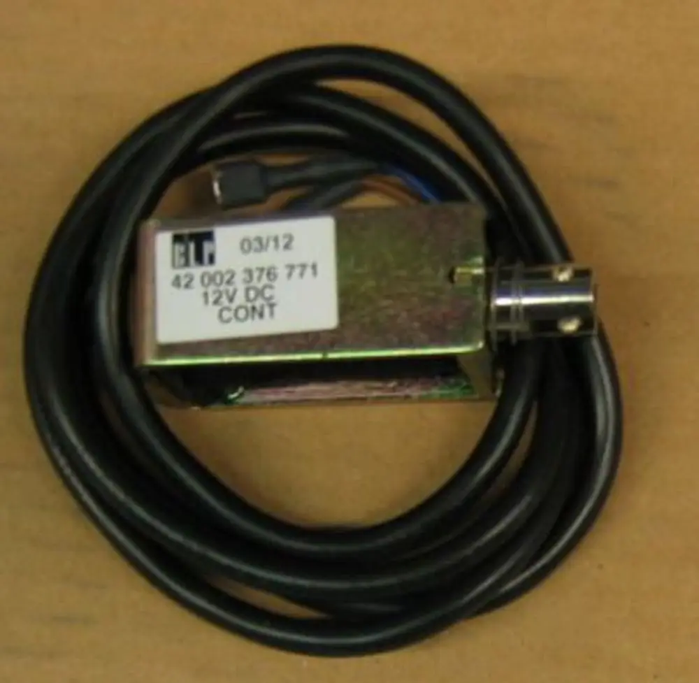 Brötje Türendschalter mit Spule, rechteckiges Gehäuse, einsteckbare Anschlussbuchse und Kabel. Das Modul ist für 12V DC ausgelegt.