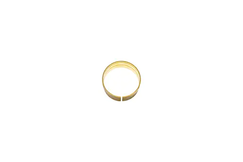 Goldfarbener, dünner Metallring auf weißem Hintergrund, möglicherweise ein Teil von Brötje Heizsystemen. Der Ring zeigt eine einfache, ringförmige Konstruktion ohne zusätzliche Details.