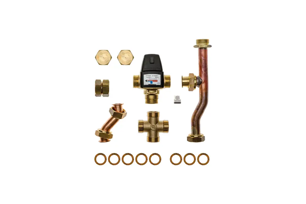 Brötje Mischventil mit verschiedenen Fittings, darunter Kupfer- und Messingelemente sowie Dichtungsringe, zur Nutzung in Trinkwassersystemen.