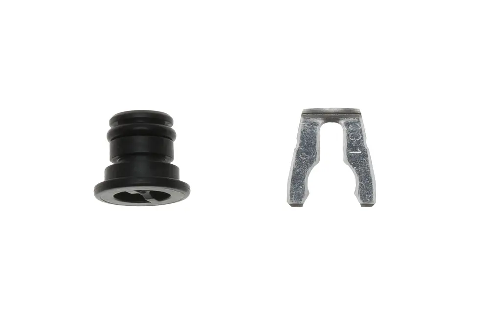 Brötje Stopfen in schwarz und Metall, bestehend aus einem runden Gummistopfen und einer Metallklammer, die für verschiedene mechanische Anwendungen genutzt werden kann.