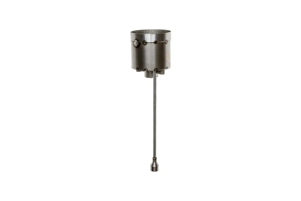 Stauscheibe von Brötje aus Metall mit einem langen Stiel. Das bekannte Design wird verwendet, um den Durchfluss in Heizungsanlagen zu regulieren.