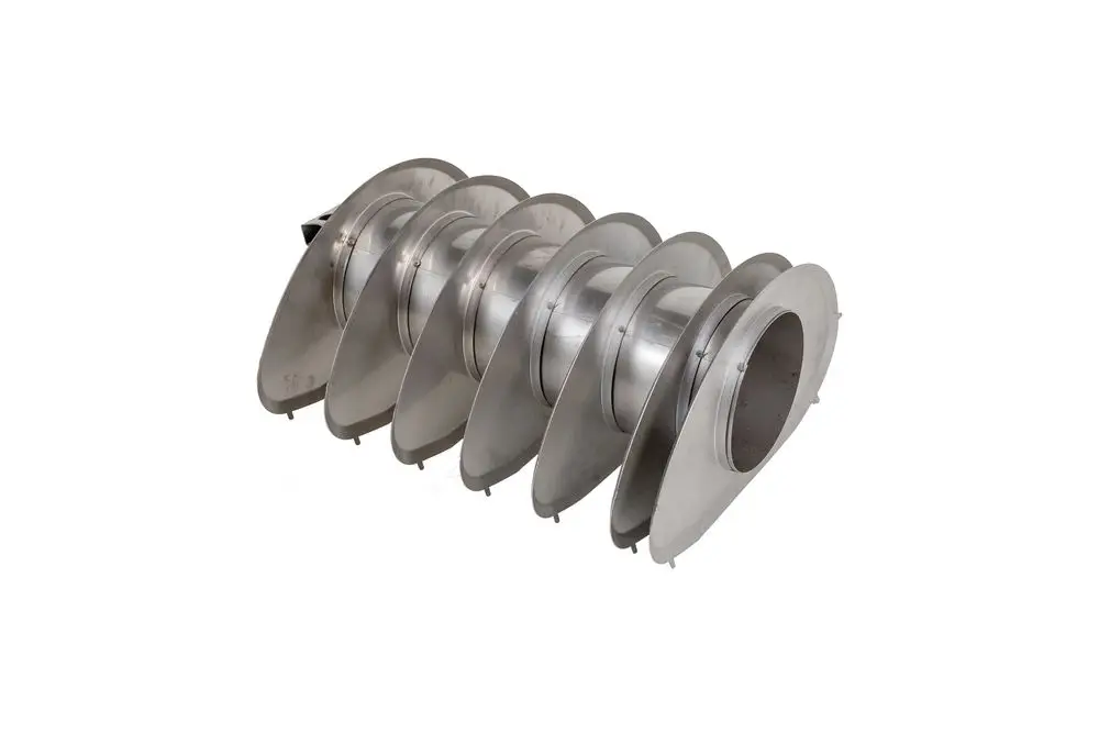 Edelstahl-Wirbulator mit mehreren gewellten Platten, geeignet für Heizsysteme. Produkt von Brötje zur Verbesserung der Wärmeübertragung.