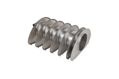 Edelstahl-Wirbulator mit mehreren gewellten Platten, geeignet für Heizsysteme. Produkt von Brötje zur Verbesserung der Wärmeübertragung.