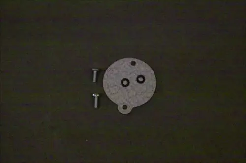 Brötje Stopfen, runde Metallplatte mit zwei O-Ringen und zwei Schrauben. Geeignet für eine technische Anwendung oder Montagesituation.