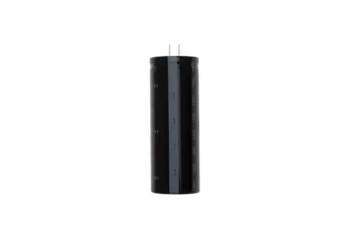 Brötje Kondensator in zylindrischer Form, schwarz lackiert mit zwei Anschlussstiften oben. Auf der Oberfläche sind nicht näher erkennbare Markierungen sichtbar.