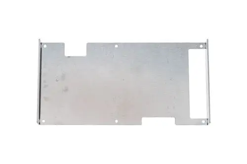 Metallplatte in silberner Farbe mit Ausschnitten und Bohrlöchern, möglicherweise zur Abdeckung oder Befestigung, stammt von Brötje.