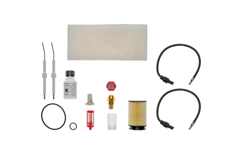 Wartungsset von Brötje mit verschiedenen Komponenten wie Filter, O-Ring, Keinelei und Schläuchen zur Instandhaltung von Heizungsanlagen.