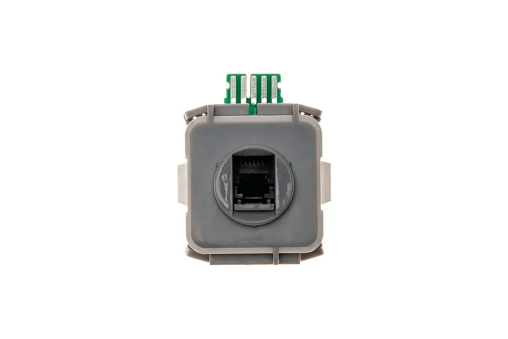 Graues Gehäuse mit RJ45-Anschluss und Leiterbahnen. Das Produkt von Brötje dient zur Datenübertragung oder als Verbindungselement in elektrischen Anwendungen.