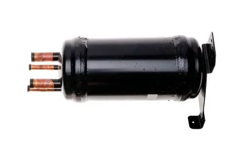 Schwarzer zylindrischer Kompressor von Brötje mit drei Kupferanschlüssen. An einer Seite ist eine Halterung sichtbar.