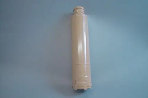 Brötje Erweiterung in zylindrischer Form, hellbeige Oberfläche, mit einem geschlossenen oberen Ende und einem Montageansatz am unteren Ende.