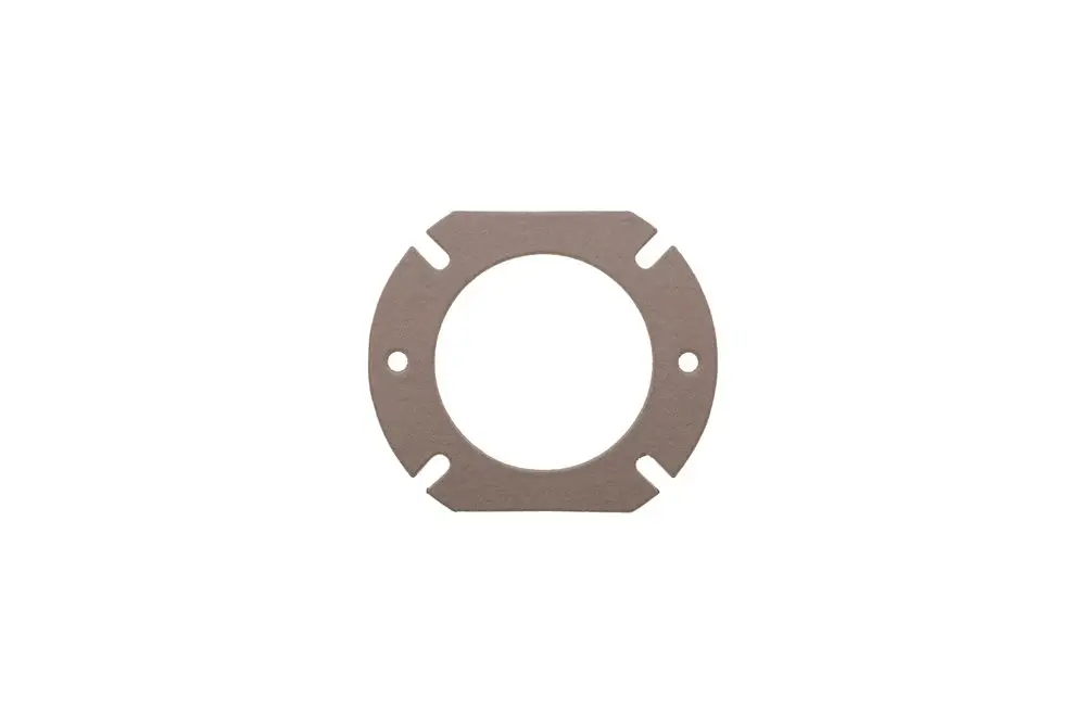 Gasket with a circular design and cutouts for mounting, used in heating systems, labeled as Brötje product.